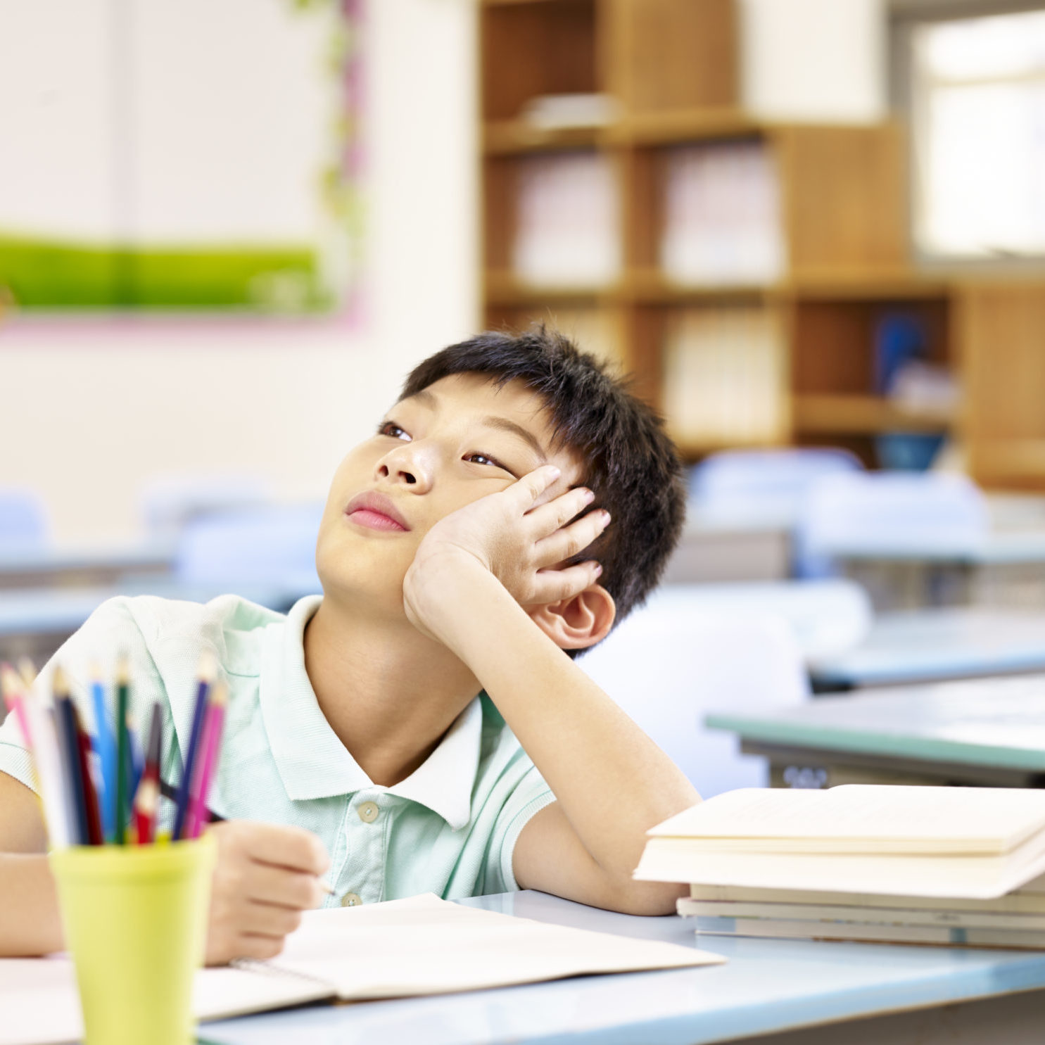 young student not focusing in class due to attention deficit hyperactivity disorder